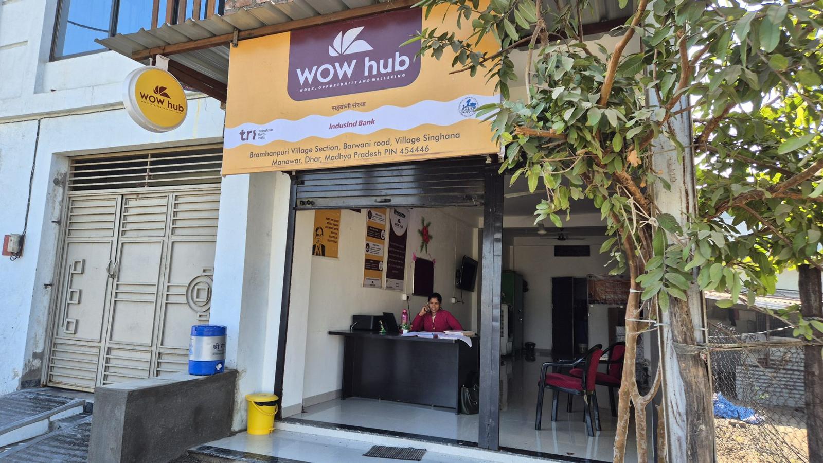 The WOW Hub building with its team standing outside